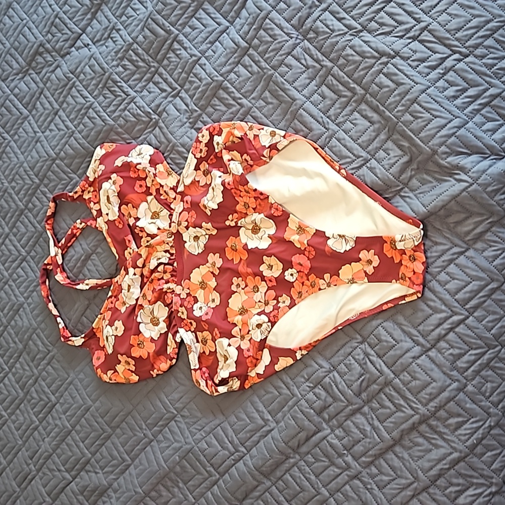 Red, pink, white one piece cutout bathing suit brand and size unknown